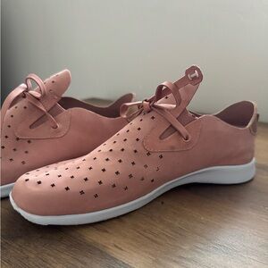 Nurture slip on shoe with a tie